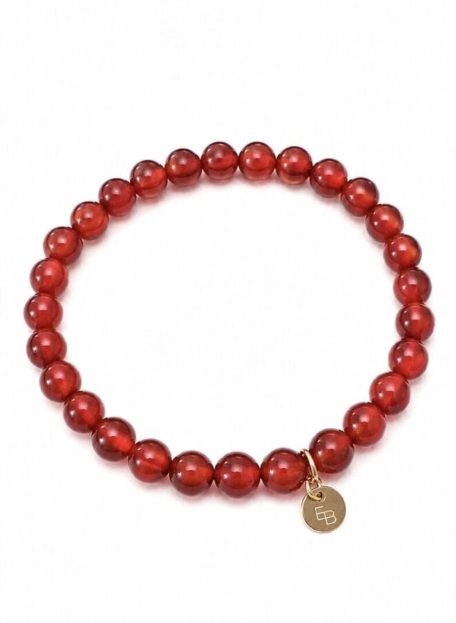 Ellen Beekmans armbandje met gemstone balletjes burnt orange (rood)