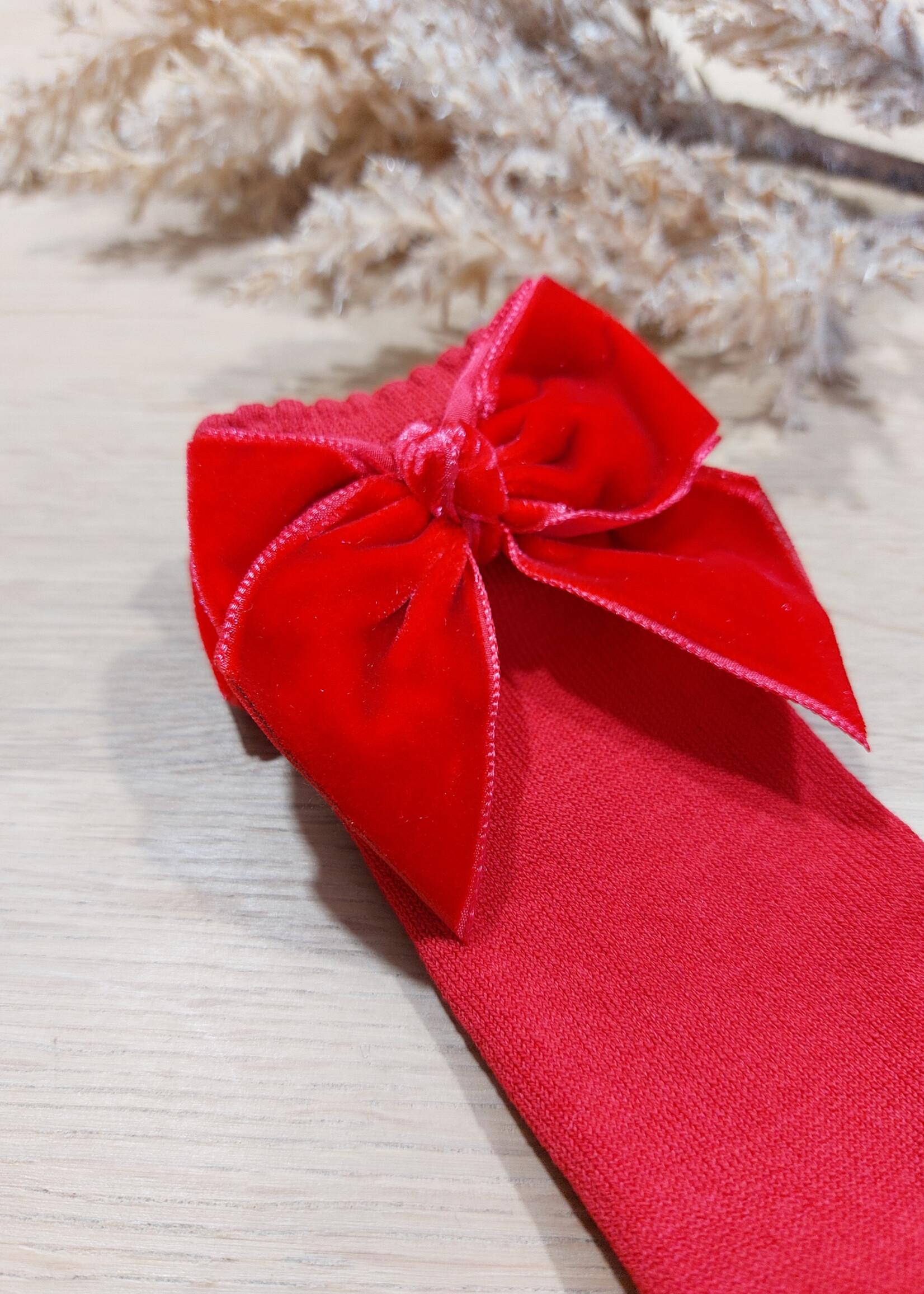 JC CASTELLA | Rode kniekousjes velvet strik