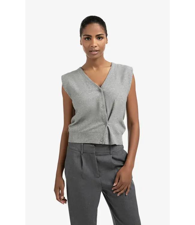 01-010120-508/99022  Knitted gilet with V-neck and asymmetric buttoning