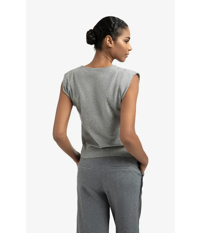 01-010120-508/99022  Knitted gilet with V-neck and asymmetric buttoning