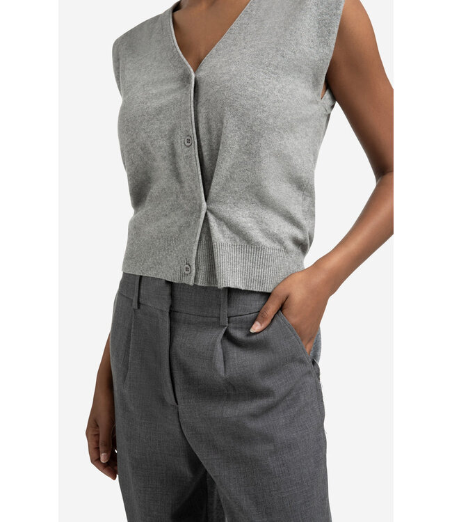 01-010120-508/99022  Knitted gilet with V-neck and asymmetric buttoning