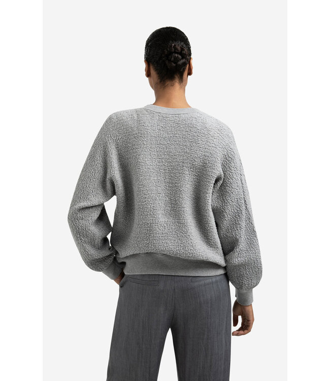 01-010121-508  Bombervest met textuur en ronde hals