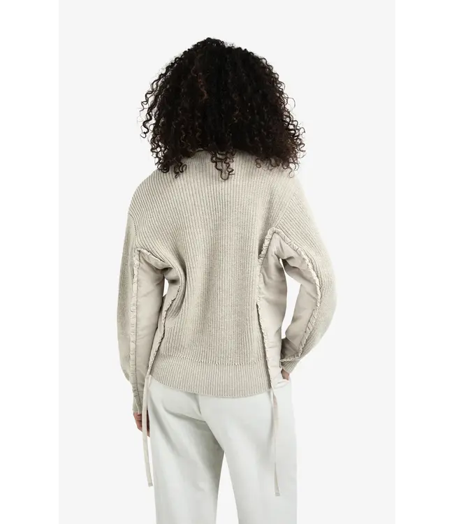 01-000509-510/99031  V-neck sweater with woven insert details and tie accents