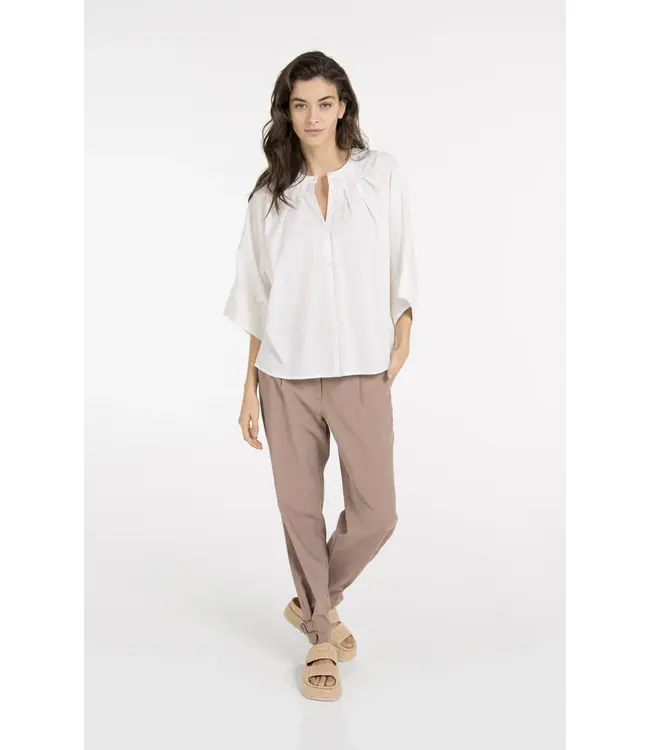 01-201217-605/99064  Batwing blouse with back pleats