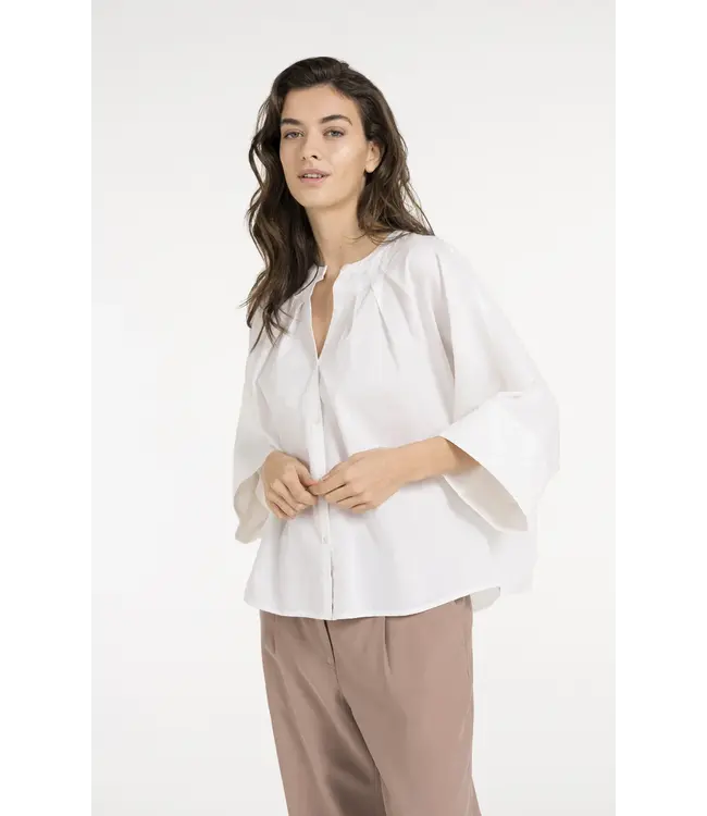 01-201217-605/99064  Batwing blouse with back pleats