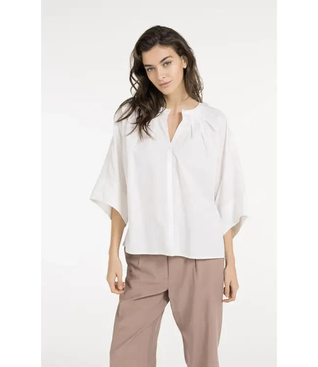 01-201217-605/99064  Batwing blouse with back pleats