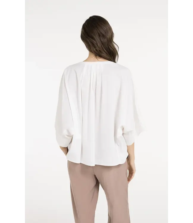 01-201217-605/99064  Batwing blouse with back pleats