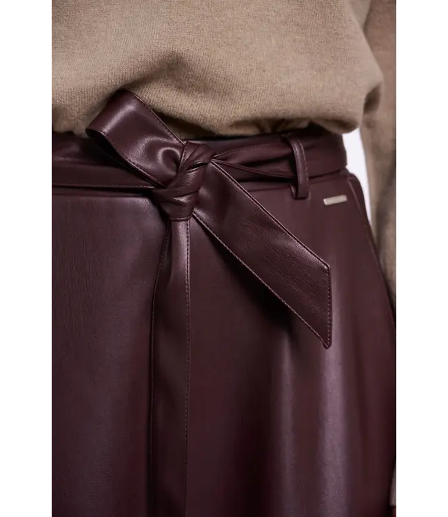 Chelsea.7502611/ChocolateBean  Faux leather skirt with belt