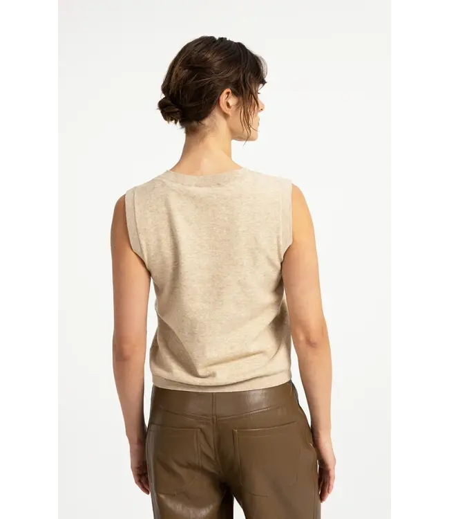 01-010170-608/990832  Knitted spencer with button closure