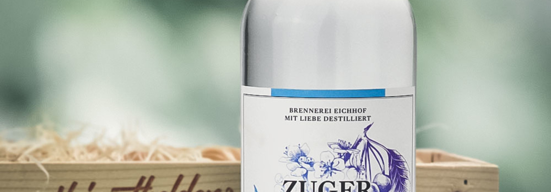 Zuger Kirsch 70cl in attraktiver Geschenk-Holzharasse