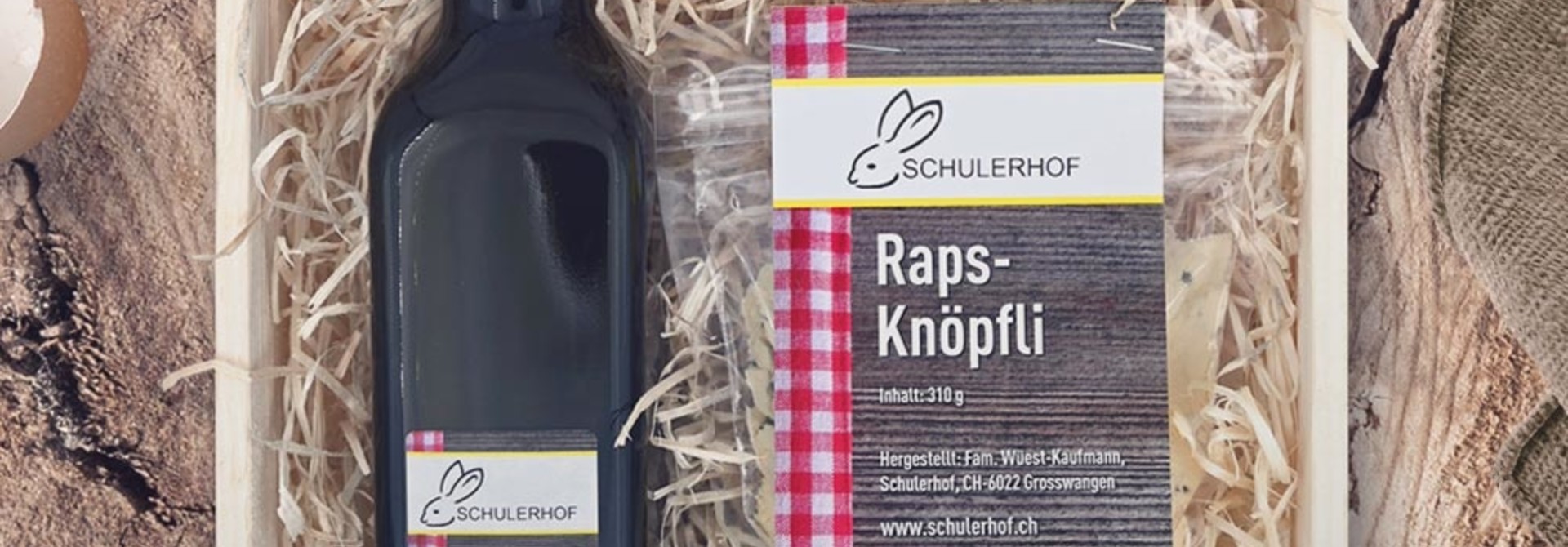 Genussbox «Raps & Süssmost» in dekorativer Geschenkharasse