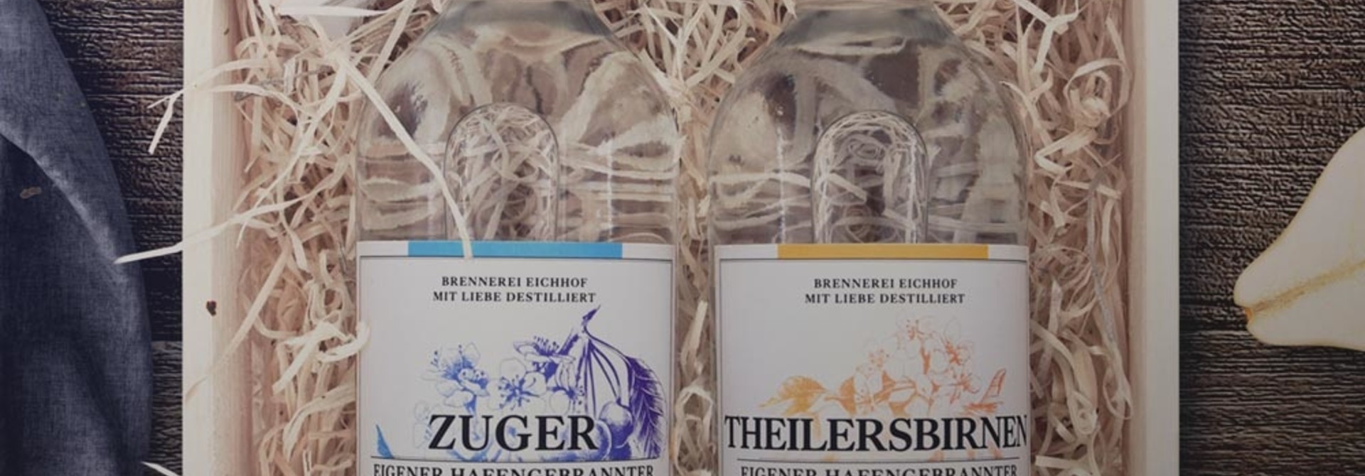 Zuger Kirsch & Theilersbirnen Träsch 70cl in Harasse