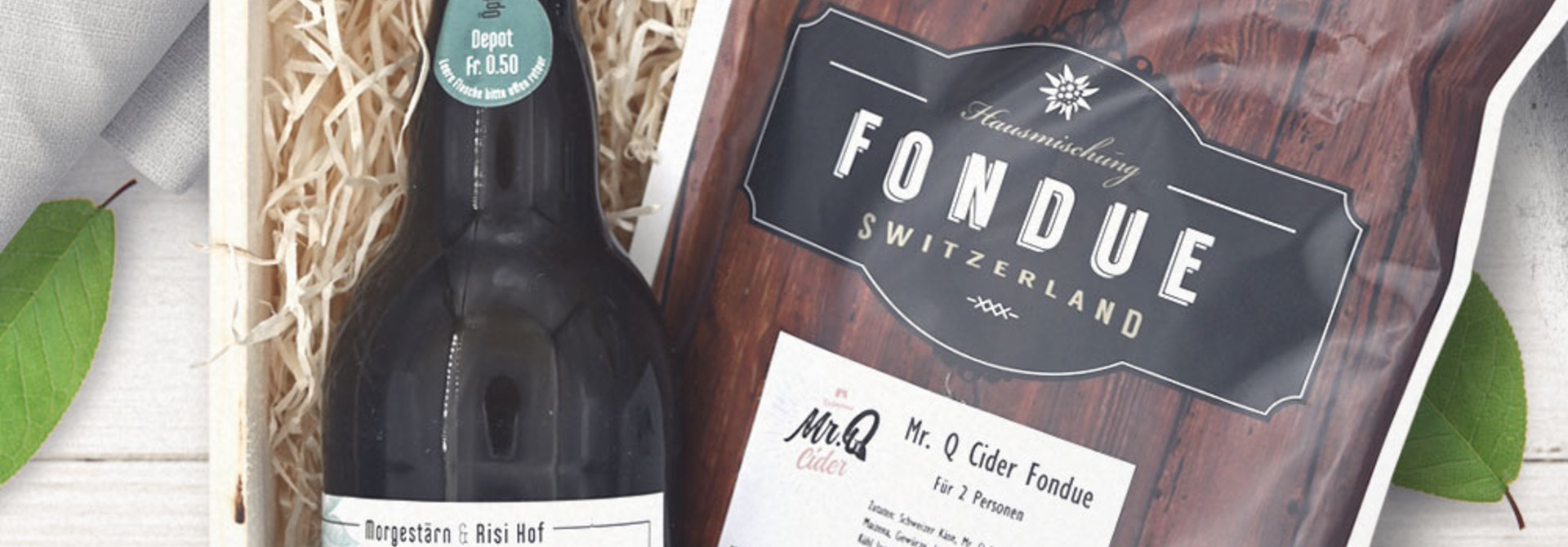 Mr. Q Geschenkset «Öpfu Cider & Fondue» in Geschenkharasse