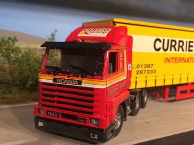 Tekno Tekno Scania 113M streamliner with tautliner semi trailer Currie European