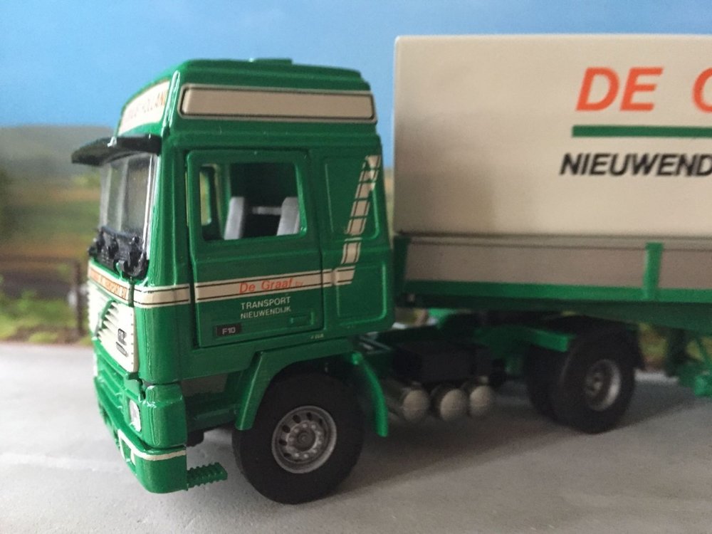 Tekno Tekno Volvo F10 with curtain side trailer de Graaf