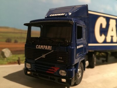 Tekno Tekno Volvo F12 with closed trailer Campari