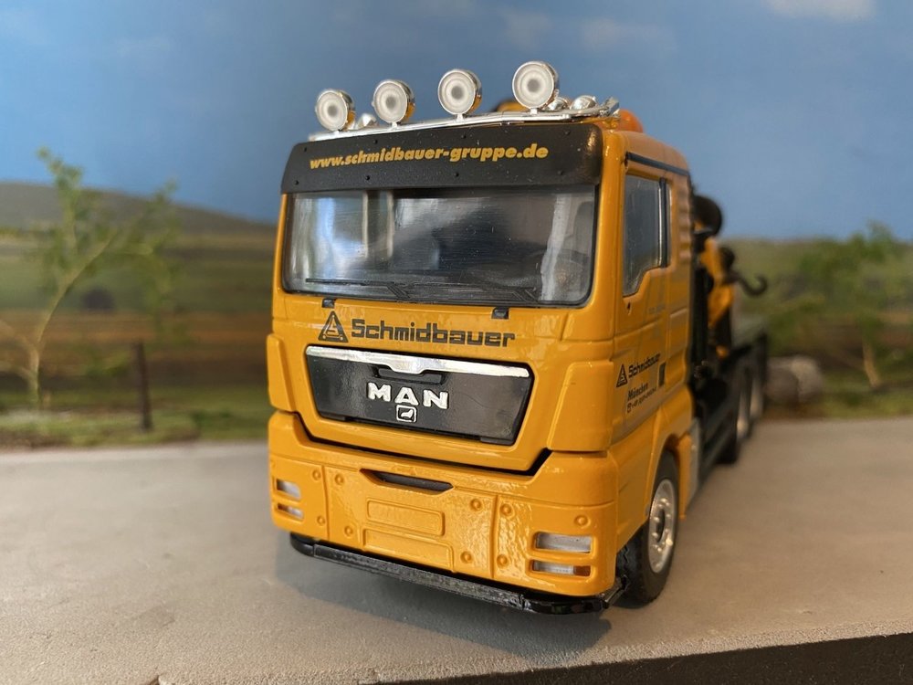 Conrad Modelle Conrad MAN TGX 3-axle box truck with Palfinger crane single truck Schmidbauer