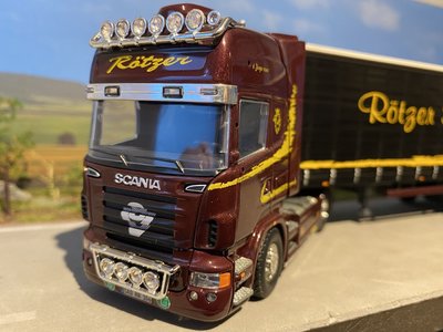 Tekno Tekno Scania R Topline met schuizeilen oplegger Rotzer