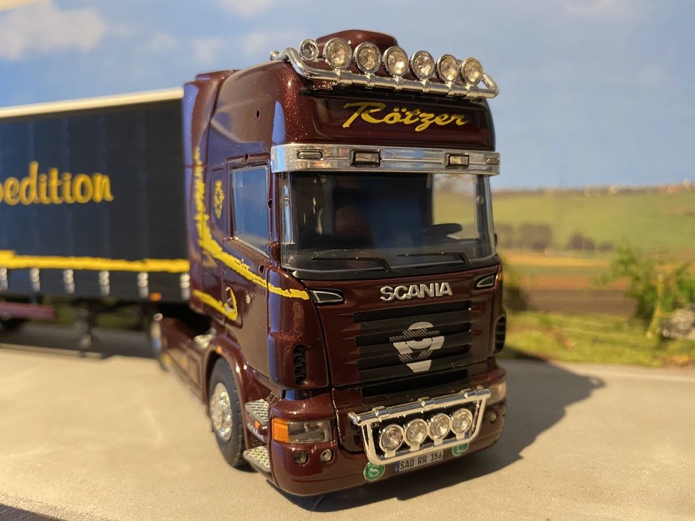 Tekno Tekno Scania R Topline with curtain side semi-trailer Rotzer