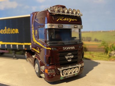 Tekno Tekno Scania R Topline met schuizeilen oplegger Rotzer