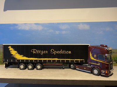 Tekno Tekno Scania R Topline met schuizeilen oplegger Rotzer