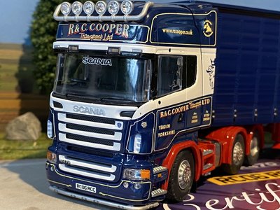 Tekno Tekno Scania R-serie Topline met schuifzeilenoplegger R&C Cooper