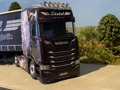 Tekno Tekno Scania Next Gen S650 highline met schuifzeilen oplegger Stelz