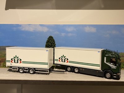 Tekno Tekno Scania Next Gen R-serie Highline motorwagen met 2-assige wipkar ALEX ANDERSEN