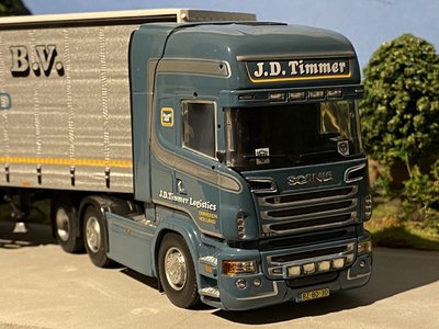 Tekno Tekno Scania R500 Topline 6x2 met schuifzeilen oplegger J.D. Timmer