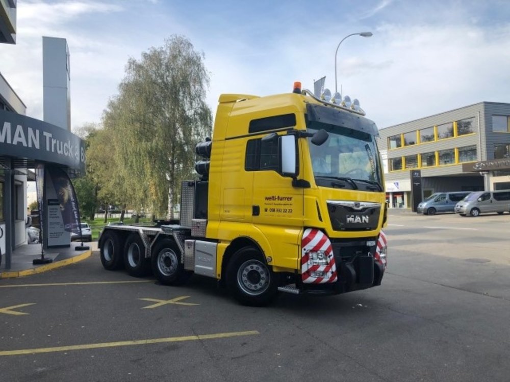 Tekno Tekno MAN TGX XXL 8x4 with 3-axle Goldhofer lowloader Welti Furrer