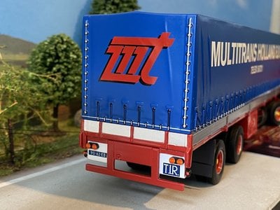 Tekno Tekno Scania 140 with 2-axle tilt trailer Fonteijn