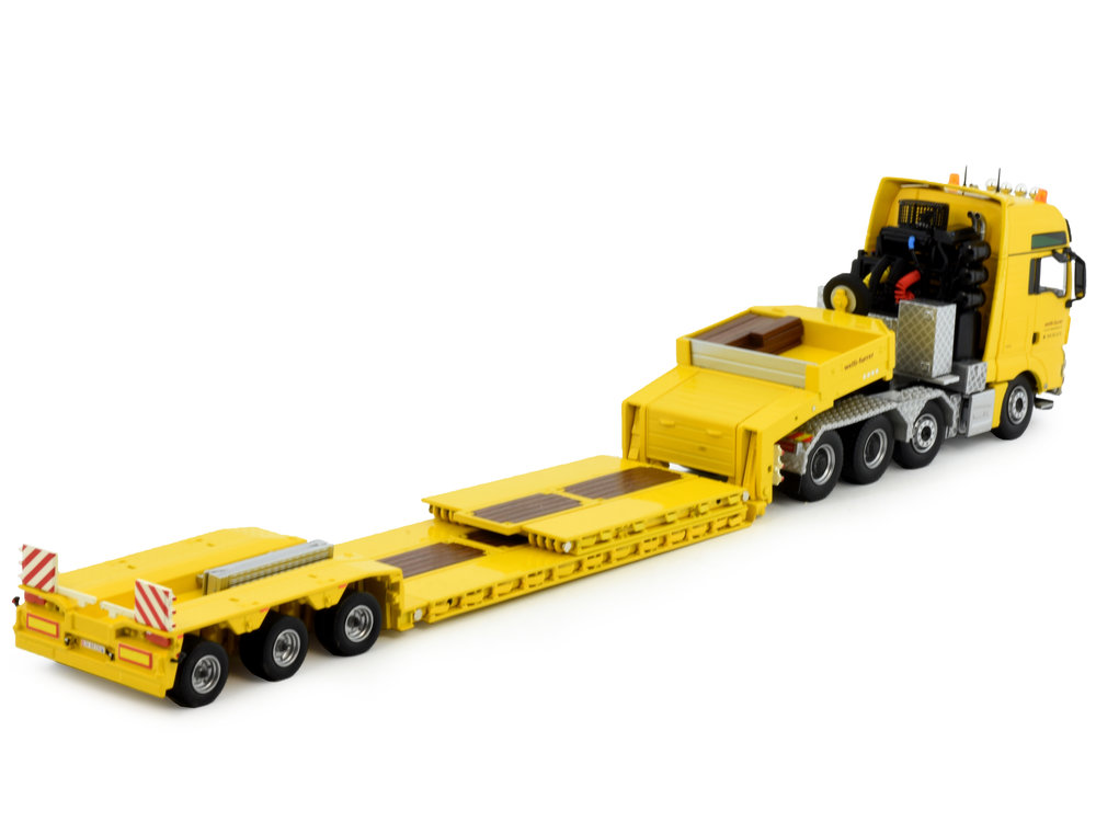 Tekno Tekno MAN TGX XXL 8x4 with 3-axle Goldhofer lowloader Welti Furrer