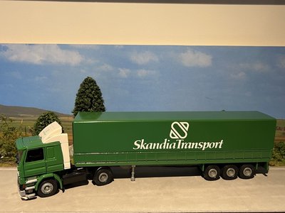 Tekno Tekno Scania 142H with 3-axle tilt trailer Skandia