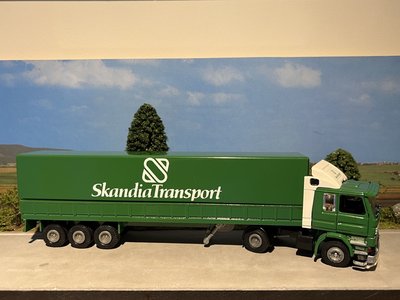 Tekno Tekno Scania 142H met 3-as huifoplegger Skandia