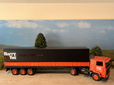 Tekno Tekno Volvo F1220  4x2 with 3-axle classic tilt trailer Harry Vos