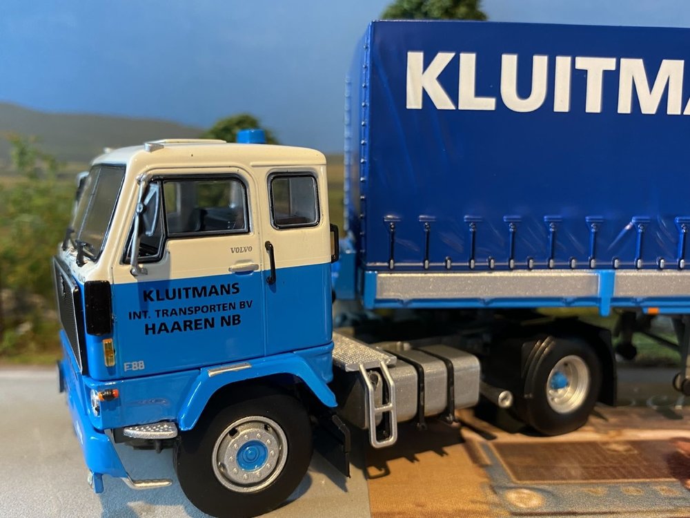 Tekno Tekno Volvo F89 with 2-axle curtain side trailer Kluitmans