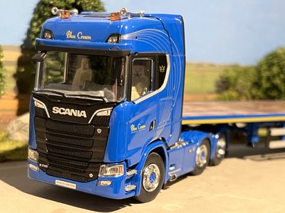 WSI IMC/Tekno  Scania S Highline 6x2 with 3-axle flatbed trailer Blue Crown