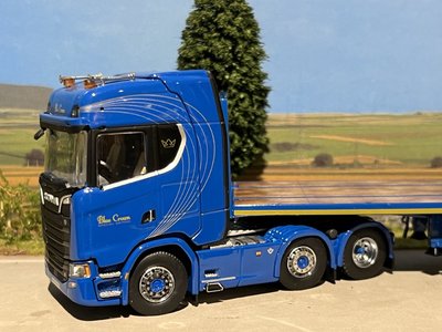 WSI IMC/Tekno  Scania S Highline 6x2 with 3-axle flatbed trailer Blue Crown