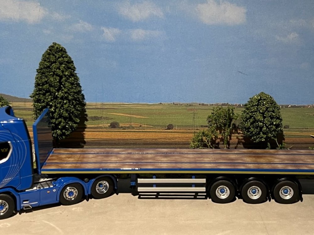 IMC IMC/Tekno  Scania S Highline 6x2 with 3-axle flatbed trailer Blue Crown