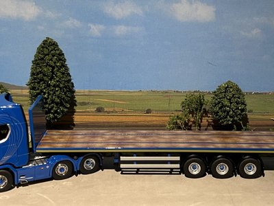 IMC IMC/Tekno  Scania S Highline 6x2 with 3-axle flatbed trailer Blue Crown