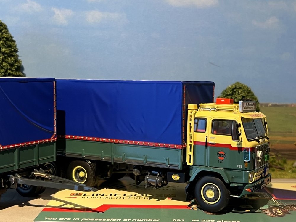 Tekno Tekno Volvo F88 rigid truck with classic tilt trailer Linjegods