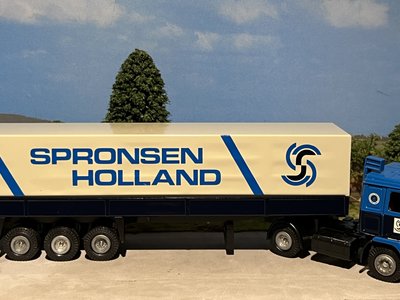 Tekno Tekno Volvo F10 with 3-axle classic tilt trailer van Spronsen