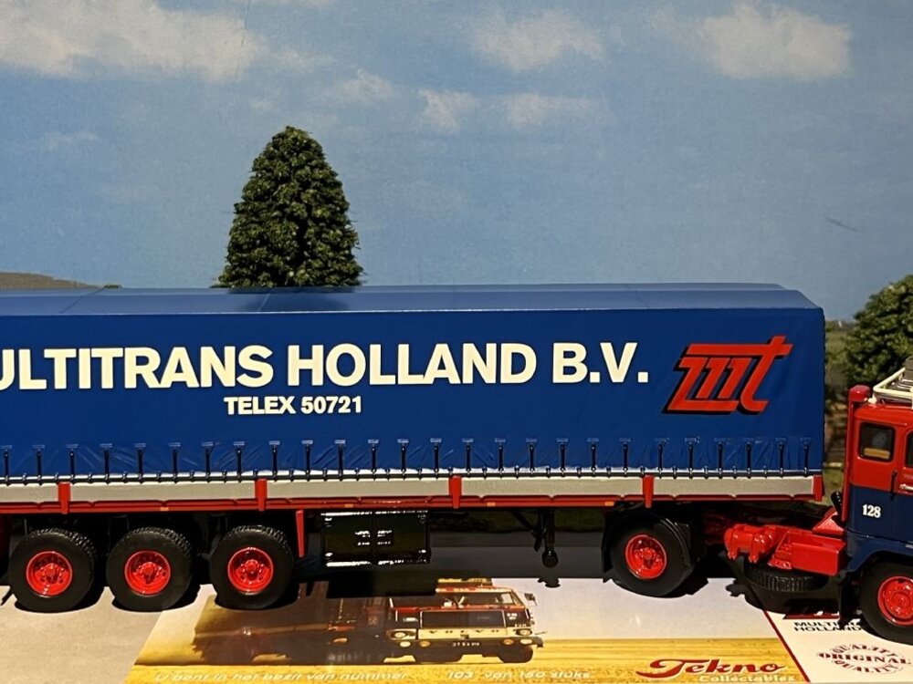 Tekno Tekno Volvo F88 with 3-axle classic tilt trailer WIM VOS - MULTITRANS