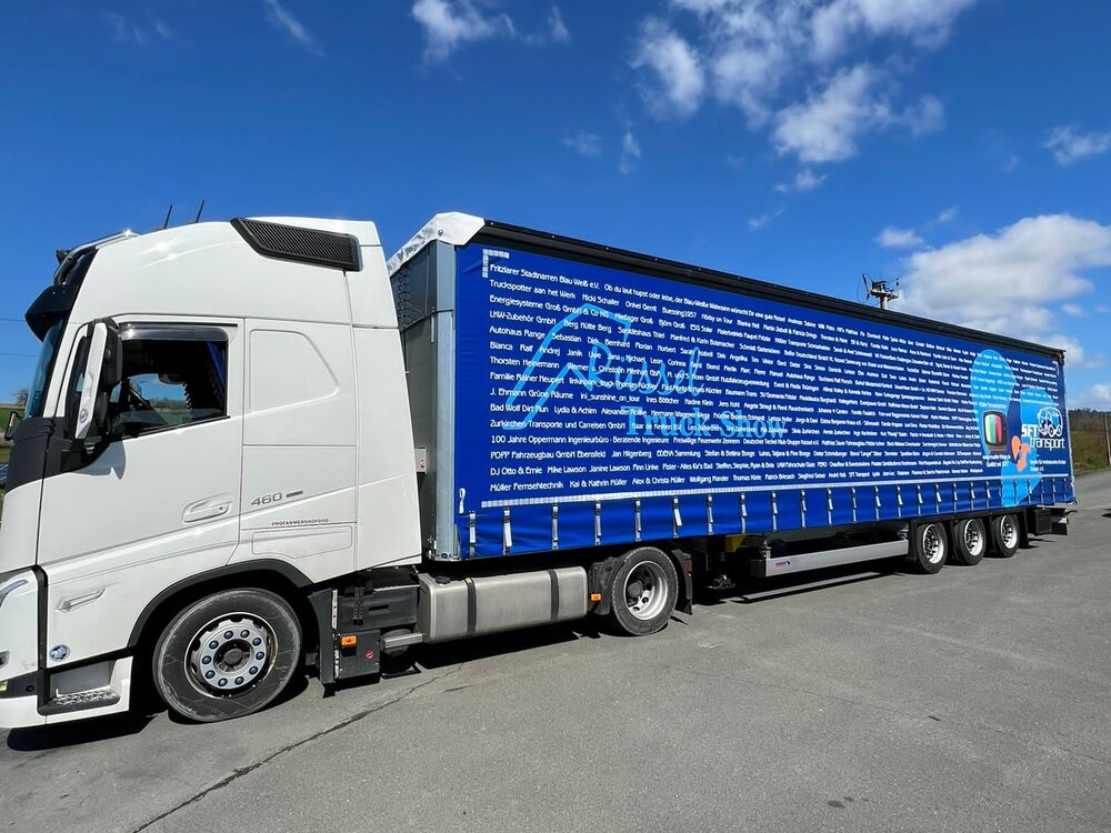 Tekno Tekno Volvo FH5 Globetrotter met schuifzeilentrailer MÜLLER SPENDENTRUCK