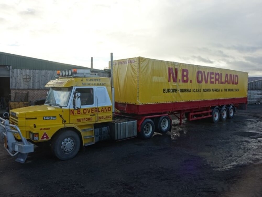 Tekno Tekno Scania Torpedo 143 met 3-assige huifoplegger N.B. OVERLAND