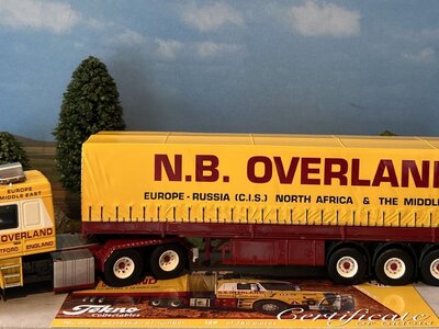 Tekno Tekno Scania Torpedo 143 met 3-assige huifoplegger N.B. OVERLAND