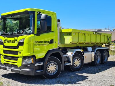 Tekno Tekno Scania Next Gen G-serie 4-assige rigid truck with hooklift container SCHNEIDER