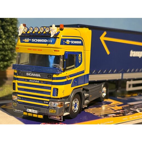 Tekno Tekno Scania 4-serie Topline with 3-axle (ASG) curtainside trailer ASG - Schneider