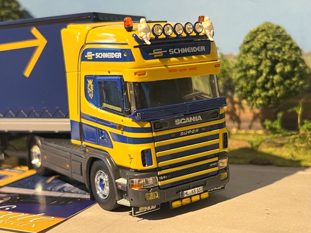 Tekno Tekno Scania 4-serie Topline met 3-assige (ASG) schuifzeilen oplegger ASG - Schneider