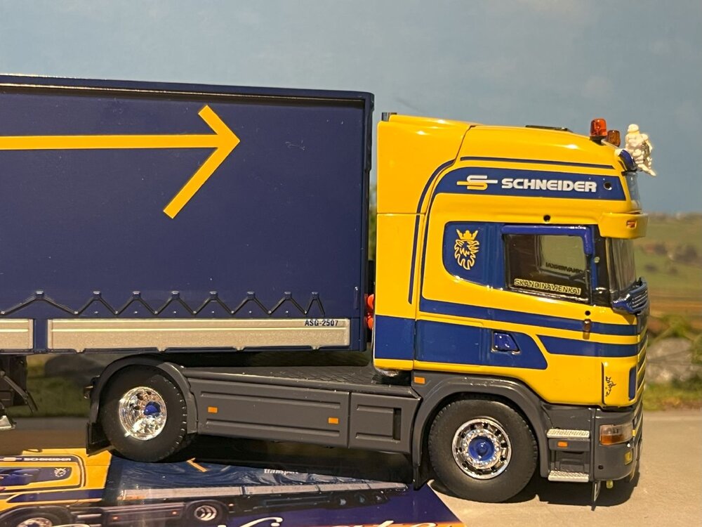 Tekno Tekno Scania 4-serie Topline with 3-axle (ASG) curtainside trailer ASG - Schneider